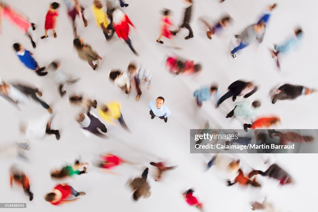 Businessman standing out from the crowd