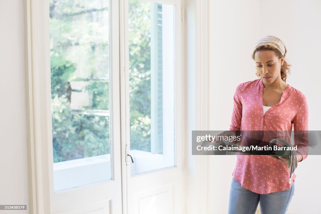 Woman looking through fabric swatches