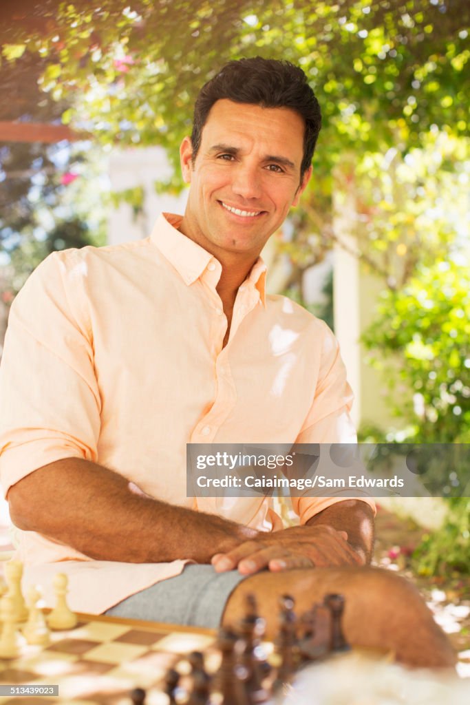 Man playing cheese outdoors