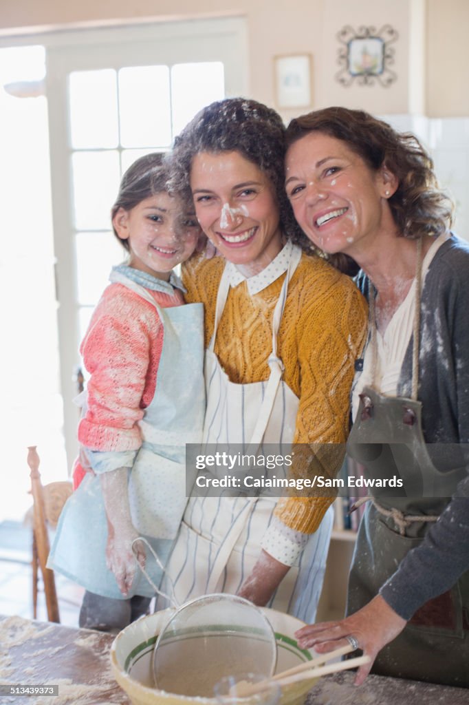 Three generations of women baking together