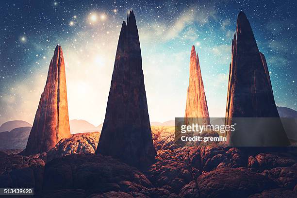 mysterious stone megaliths in fantasy landscape - stone circle stockfoto's en -beelden