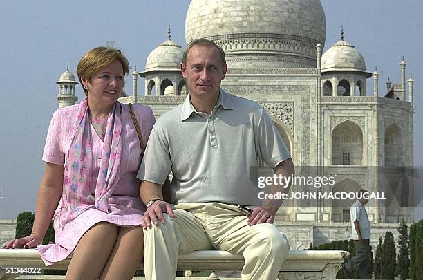Russian President Vladimir Putin poses with his wife Lyudmila in front of the Taj Mahal 04 October 2000. Putin is on a three-day visit to India. AFP...