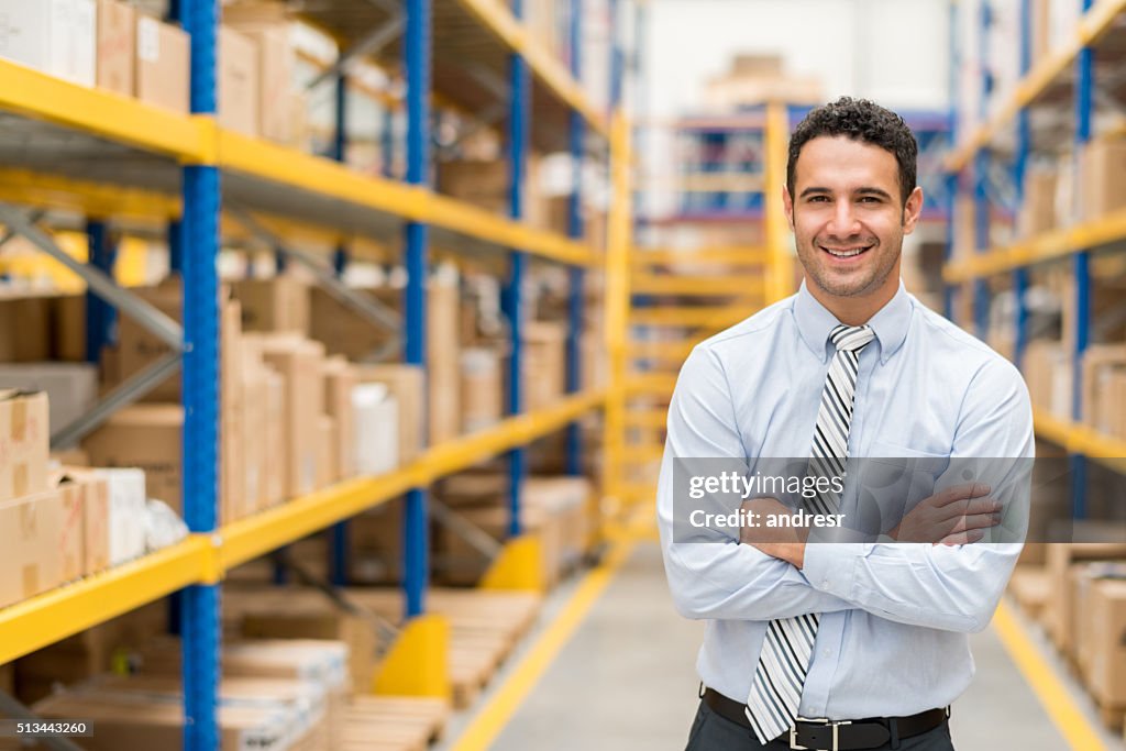 Business man in a warehouse