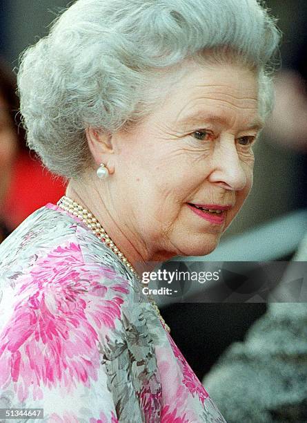 Queen Elizabeth II of Britain visits the Immigration Museum in Melbourne 23 March 2000. The Queen is on a two-week visit to Australia, her first...