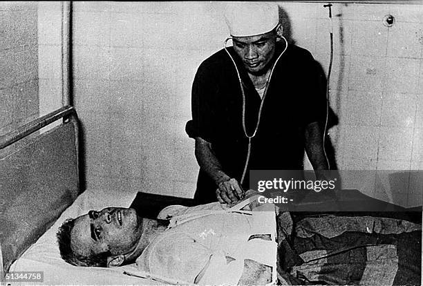 Photo taken in 1967 shows US Navy Airforce Major John McCain being examined by a Vietnamese doctor. John McCain, current US presidential hopeful, was...