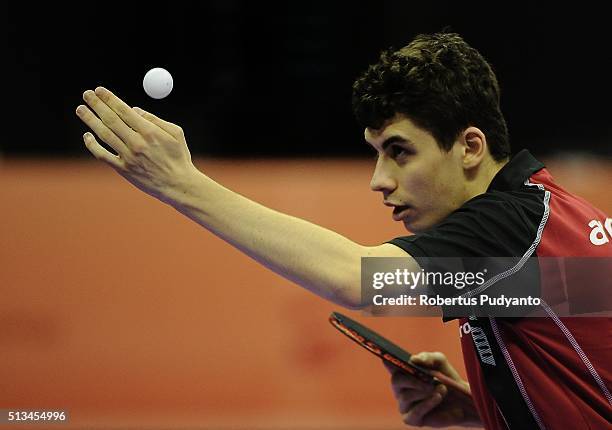 Jakub Dyjas of Poland competes against Liam Pitchford of England during the 2016 World Table Tennis Championship Men's Team Division round 16 match...