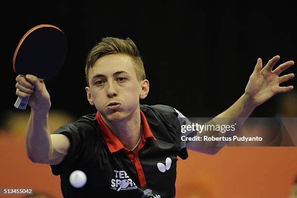 Liam Pitchford of England competes against Jakub Dyjas of Poland during the 2016 World Table Tennis Championship Men's Team Division round 16 match...