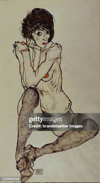 Seated female nude. Elbows resting on right knee. Gouache and pencil by Egon Schiele. 48,3 x 32 cm. Graphische Sammlung Albertina. Inv. No 31.632. By...