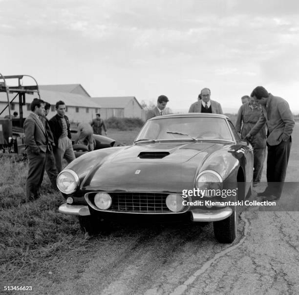 The prototype for the new 'Ferrari 250 GT Berlinetta SWB' on test at the Modena Aerautodromo, with the Ferrari transporter in the background....