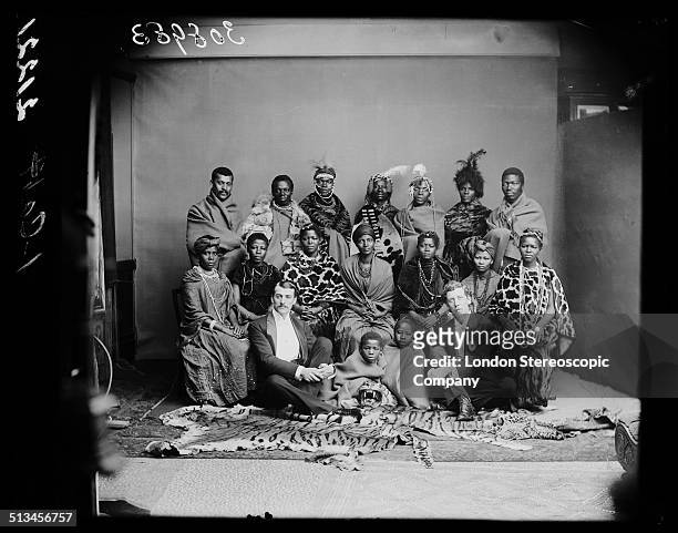 Members of The African Choir pose for a group portrait with their English choir manager, Walter Letty , and musical director James Balmer, 1891. The...