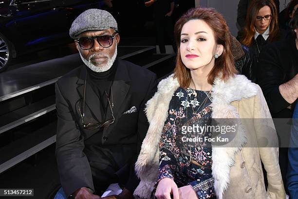 Eriq Ebouaney and Marine Miquel attend the Christophe Guillarme show as part of the Paris Fashion Week Womenswear Fall/Winter 2016/2017 on March 2,...