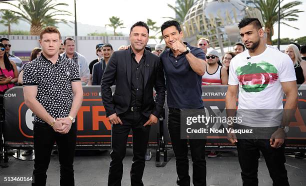 Canelo Alvarez, Oscar De La Hoya, Mario Lopez and Amir Khan visit "Extra" at Universal Studios Hollywood on March 2, 2016 in Universal City,...