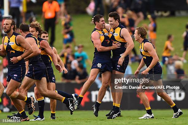 Patrick McGinnity and Jeremy McGovern of the Eagles celebrates a goal to win the game during the 2016 NAB Challenge match between the West Coast...