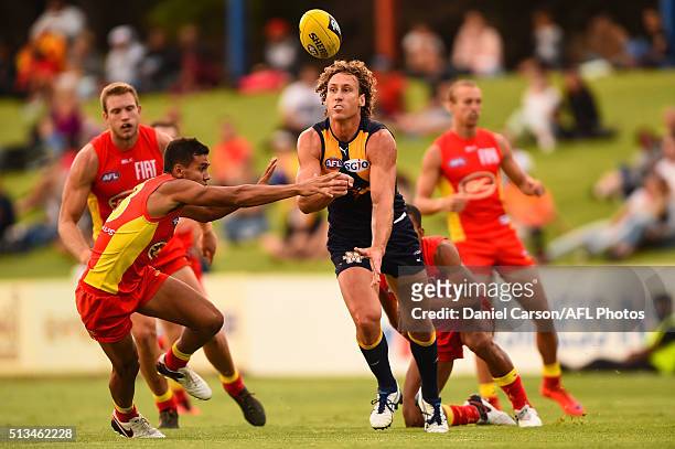 Matt Priddis of the Eagles releases a handball during the 2016 NAB Challenge match between the West Coast Eagles and the Gold Coast Suns at HBF...