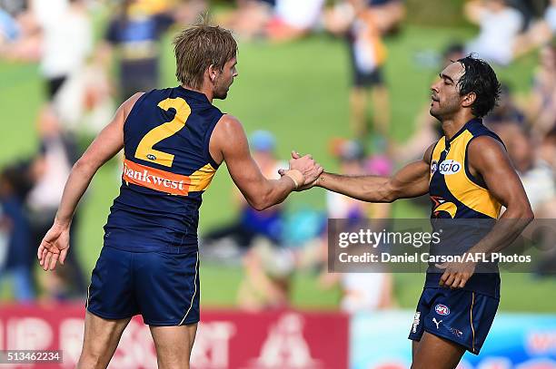 Jamie Bennell and Mark LeCras of the Eagles celebrates a goal during the 2016 NAB Challenge match between the West Coast Eagles and the Gold Coast...