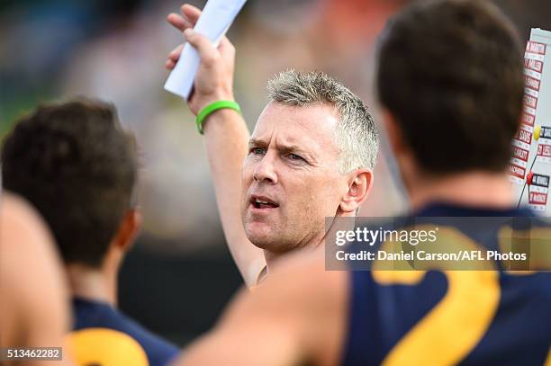 Adam Simpson, coach of the Eagles addresses the team at quarter time during the 2016 NAB Challenge match between the West Coast Eagles and the Gold...