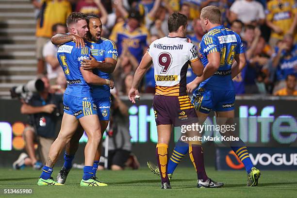 Clint Gutherson and Ken Edwards of the Eels celebrate Clint Gutherson scoring a try during the round one NRL match between the Parramatta Eels and...