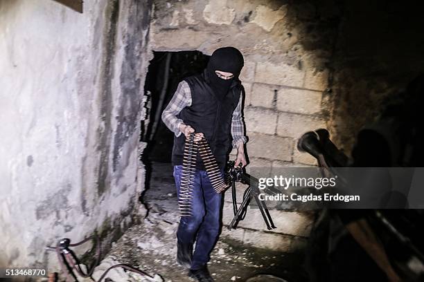 Member of armed group Patriotic Revolutionary Youth Movement , a youth division of the Kurdistan Workers' Party, PKK, prepare for an attack to...