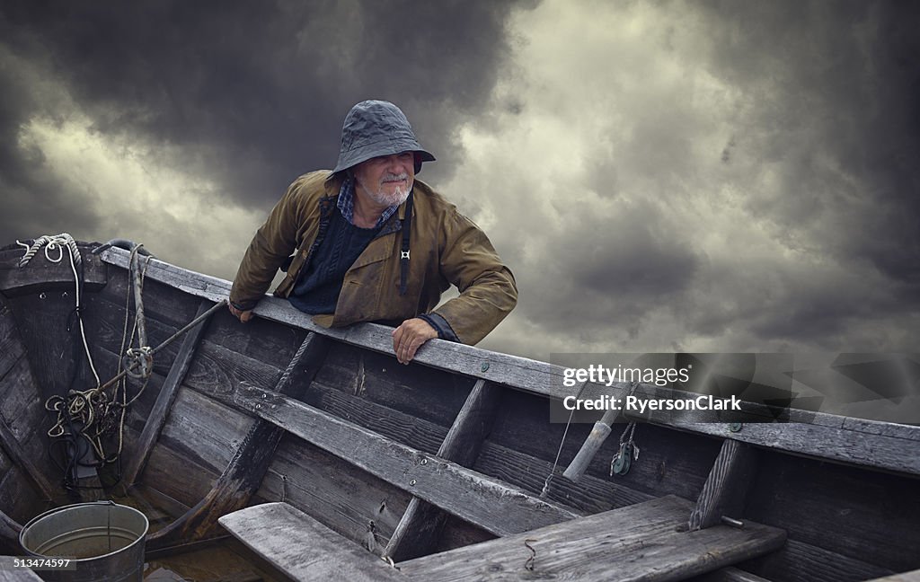 Fisherman Portrait, Stormy Sky and Dory, Nova Scotia