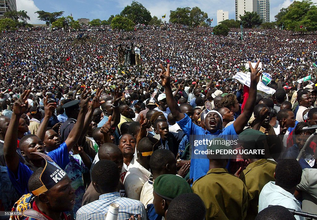 Kenyans gather for the swearing in ceremony of new