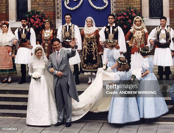 Exiled Crown Prince Pavlos of Greece and his bride Marie-Chantal Miller, daughter of American-born businessman Robert W. Miller, wave after their...