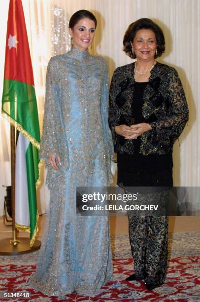Jordan's Queen Rania and Egypt's First Lady Suzanne Mubarak pose for photographers ahead of a dinner on the occasion of the second Arab Women's...