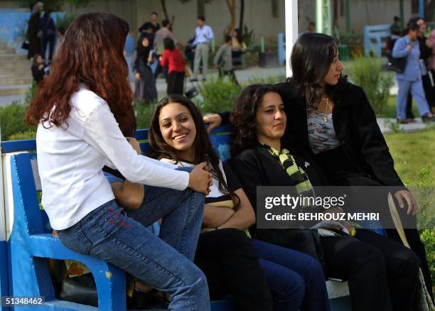 Iraqi Kurd students take a break at the courtyard of the Suleimaniya university in the Patriotic Union of Kurdistan -controlled city of Suleimaniya,...