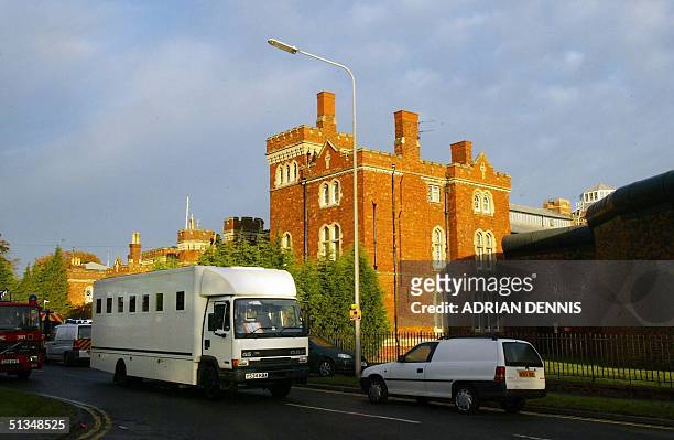 Prison van transports inmates from Lincoln Jail early 24 October 2002. British anti-riot police regained control 24 October morning at the prison...