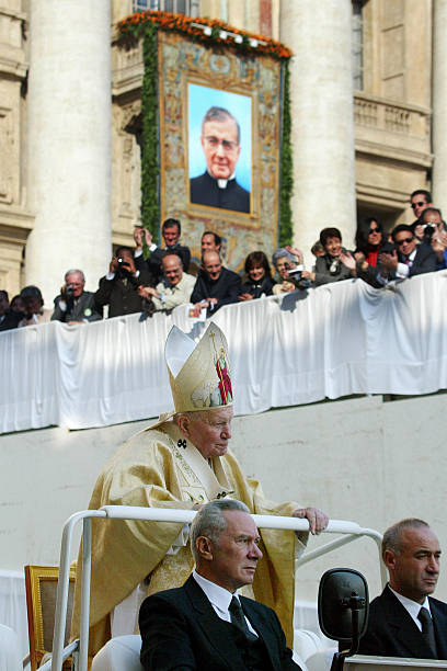 Pope John Paul II arrives at the canonization mass for Opus Dei founder Jose Maria Escriva de Balaguer at Saint Peter Square in the Vatican, 06...