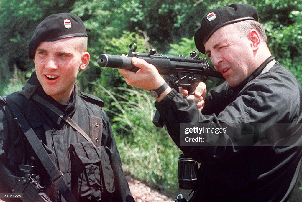 Zeljko "Arkan" Raznatovic (R), commander of the Se