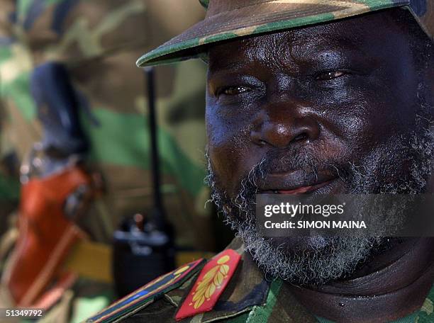 Chief commandant of Sudanese People Liberation Army John Garang, speaks to journalists, 11 June 2002 in Kapoeta, southern Sudan. South Sudanese...