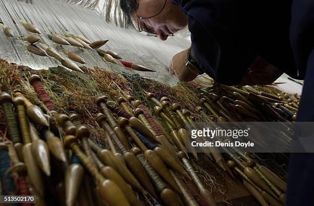 Jose Antonio Carbajal works with his weaving quills on a tapestry for the rebuilt Residenzscholss in Dresden at the Royal Tapestry Factory on March...