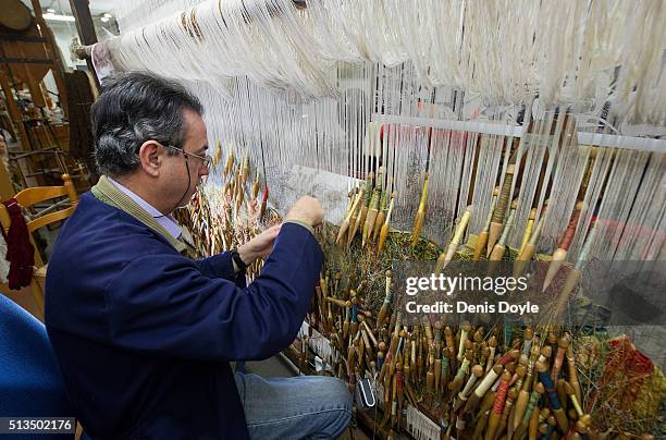 Jose Antonio Carbajal works with his weaving quills on a tapestry for the rebuilt Residenzscholss in Dresden at the Royal Tapestry Factory on March...
