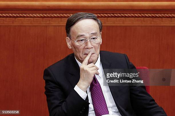 Secretary of the Central Commission for Discipline Inspection Wang Qishan attends opening session of the Chinese People's Political Consultative...