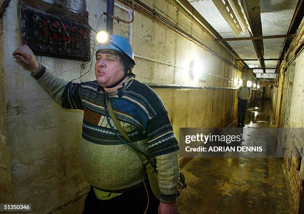 Nick Catford a member of Subterranea Britannica, inside a secret Second World War underground bunker in Neasden, west London 16 April 2002. The...