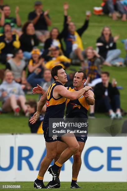 Jeremy McGovern and Shannon Hurn of the Eagles celebrate the winning goal during the 2016 AFL NAB Challenge match between the West Coast Eagles and...