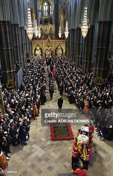 The Queen Mother's coffin arrives at Westminster Abbey for the funeral service in London 09 April 2002.The funeral is the culmination of more than a...