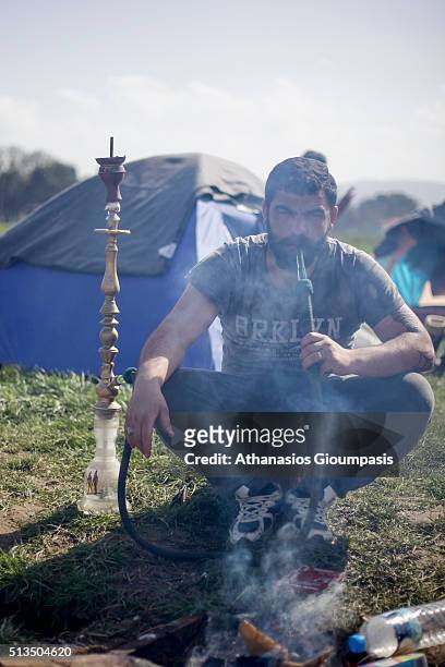 Refugees are waiting in Idomeni transit camp to cross the border on the Greek-FYROM border on March 01, 2016 in Idomeni, Greece. More than 7,000...