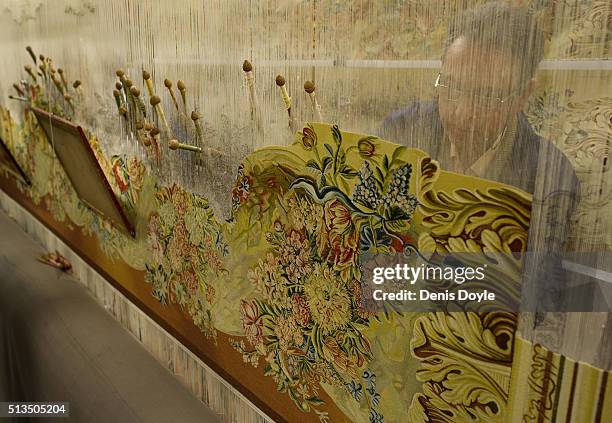 Jose Antonio Carbajal works on a tapestry for the rebuilt Residenzschloss in Dresden at the Royal Tapestry Factory on March 2, 2016 in Madrid, Spain....