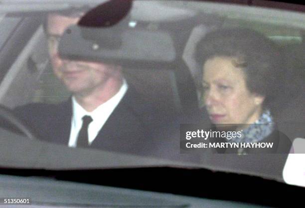 Britain's Princes Anne and her husband Commander Tim Lawrence leaving the Chapel Royal Windsor Park, 31 March after paying their respects to Queen...