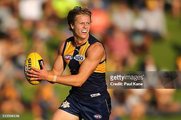 Jackson Nelson of the Eagles looks to pass the ball during the 2016 AFL NAB Challenge match between the West Coast Eagles and the Gold Coast Suns at...