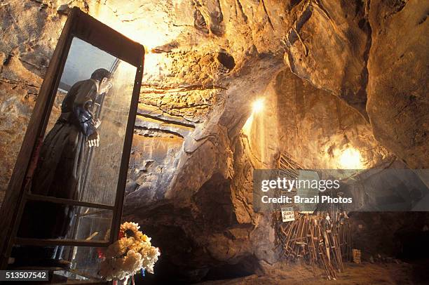 Gruta Sao Geraldo - religious image and objects left by pilgrims wwhose prayers and faith were answered ) in Bom Jesus da Lapa, Bahia State,...