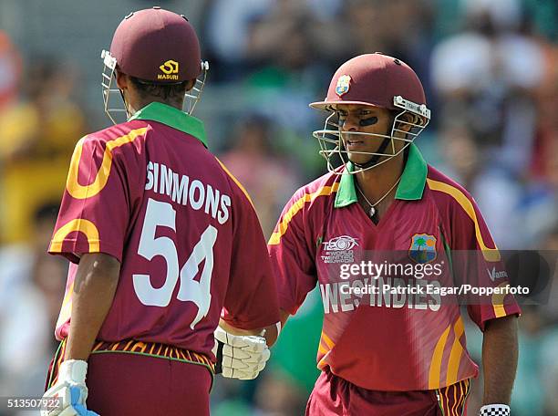 West Indies batsman Shivnarine Chanderpaul congratulates Lendl SImmons on his half-century during the ICC World Twenty20 Super Eights match between...