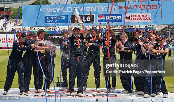 England captain Charlotte Edwards lifts the trophy as her team celebrate winning the ICC Women's World Twenty20 Final between England and New Zealand...