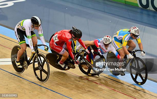 Sze Wai Lee of Hong Kong and Anastasiia Voinova of Russia crash while racing in the Women's Keirin during Day Two of the UCI Track Cycling World...