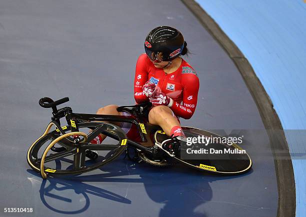 Sze Wai Lee of Hong Kong sits on the floor having has a crash while racing in the Women's Keirin during Day Two of the UCI Track Cycling World...