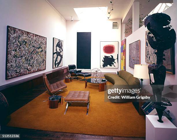 Living room of Art Historian William Rubin's New York apartment with artwork Franz Kline, Barnett Newman, Adolph Gottlieb, a Barcelona chair and an...