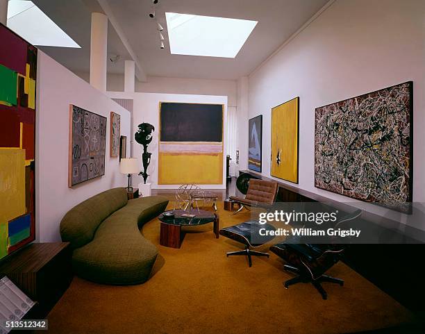 Living room of Art Historian William Rubin's New York apartment with artwork by Hans Hoffmann, Gottlieb, de Kooning, Andre Masson, Herbert Ferber,...