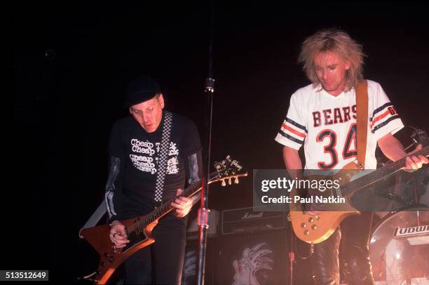 American musicians Rick Nielsen and Robin Zander of the band Cheap Trick perform at the Riviera Theater, Chicago, Illinois, 1980s.