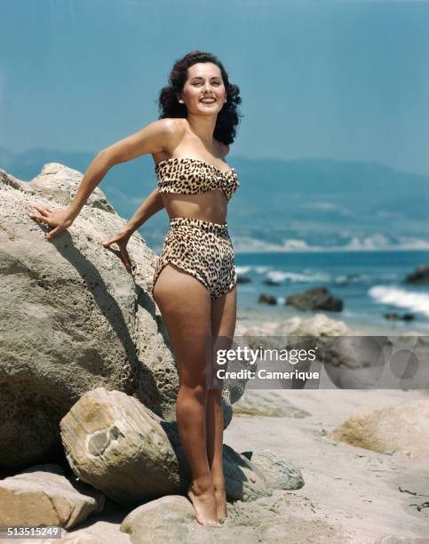 Pinup girl on the beach, Los Angeles, California, 1949.